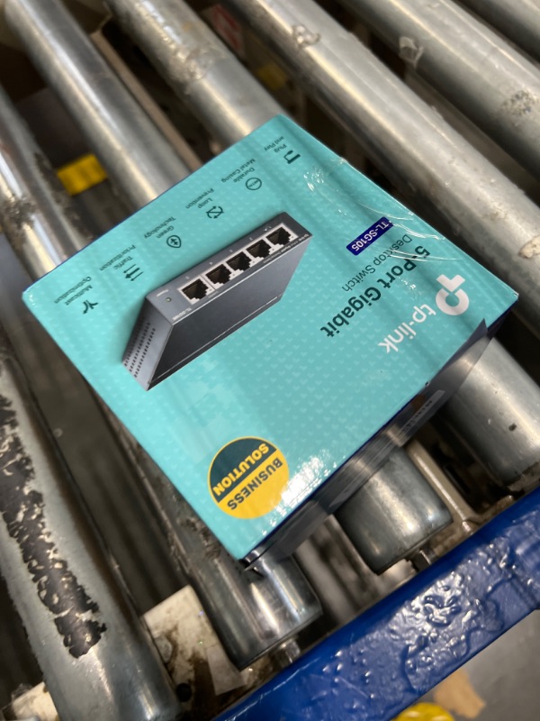 Photo 1 of TP-Link TL-SG105, 5 Port Gigabit Unmanaged Ethernet Switch, Network Hub, Ethernet Splitter, Plug & Play, Fanless Metal Design, Shielded Ports, Traffic Optimization,Navy Blue