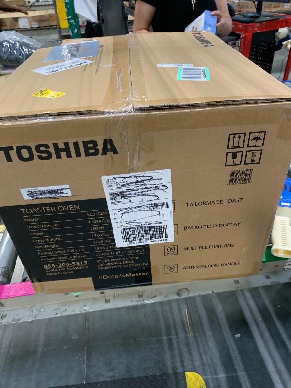 Photo 1 of TOSHIBA AC25CEW-BS Large 6-Slice Convection Toaster Oven Countertop, 10-In-One with Toast, Pizza and Rotisserie, 1500W, Black Stainless Steel, Includes 6 Accessories