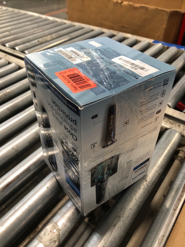 Photo 1 of ***NEEDS CLEANING***Philips Norelco Shaver 7800, Rechargeable Wet & Dry Electric Shaver with SenseIQ Technology, Quick Clean Pod, Charging Stand, Travel Case and Pop-up Trimmer, S7885/85