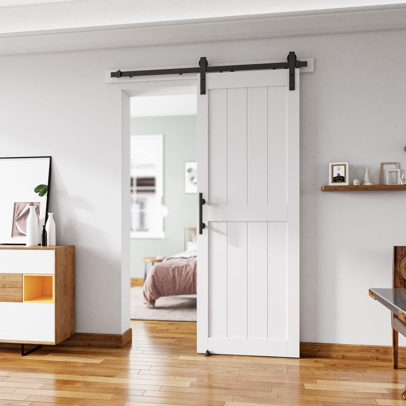Photo 1 of **may not be exact match**
42in x 84in MDF Sliding Barn Door with 7ft Barn Door Hardware Kit & Handle, Pre-Drilled Holes Easy Assembly -Solid Barn Door Slab Covered with Water-Proof PVC Surface, White, H-Frame