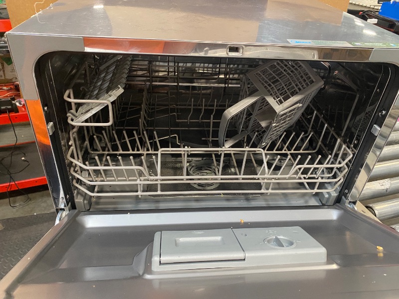 Photo 1 of **item is used-has food particles at bottom of dishwasher**
Midea MDC22P2ASS Countertop, Portable Place Settings & 6+2 Washing Cycles. Energy Star Dishwasher, Dish Washer for Dorm, RV& Apartment, Sliver, Silver