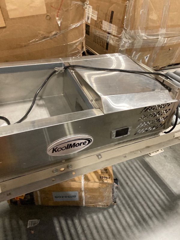 Photo 1 of **MISSING SNEEZE GAURD-FOOD BINS ARE NOT INCLUDED**HARD WATER STAINS**
KoolMore SDC-8P-SG Condiment Prep Rail Station with Sneeze Guard, 71 Inch, Silver