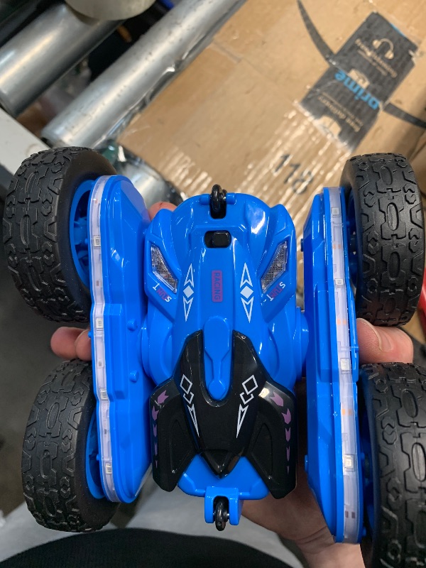 Photo 1 of (MISSING REMOTE) (UNTESTED) Terucle Remote Control Car, Rc Cars Stunt Kids Toys New Upgraded Strip Lights and Headlights Double-Sided 360° Rotating 4WD Drift Truck for Boys Girls Birthday Gift (Blue)
