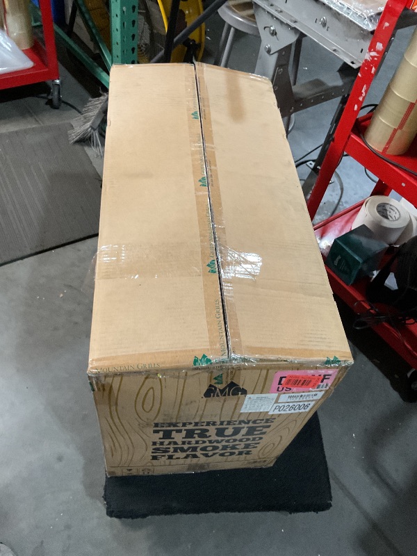 Photo 1 of **STOCK PHOTO FOR REFERENCE ONLY **DAVY CROCKETT WIFI WOOD FIRED GRILL 150-550 degrees