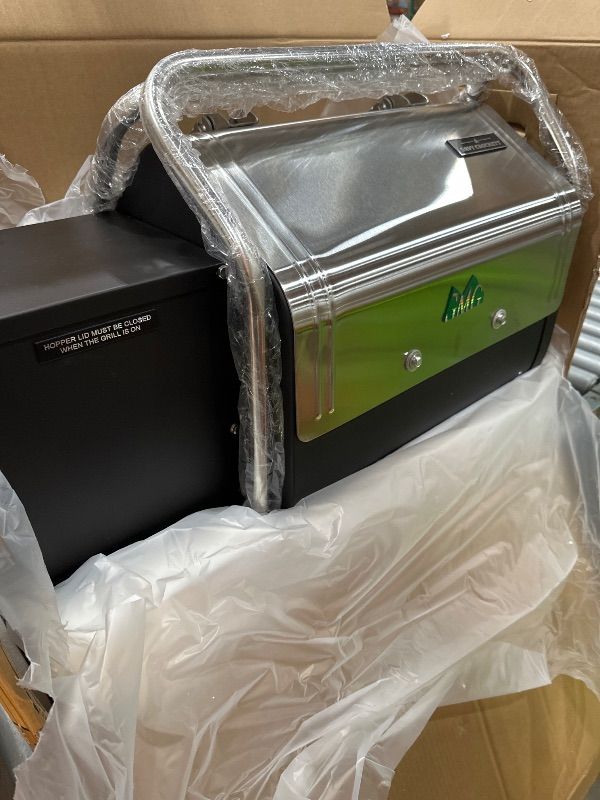 Photo 1 of **STOCK PHOTO FOR REFERENCE ONLY **DAVY CROCKETT WIFI WOOD FIRED GRILL 150-550 degrees