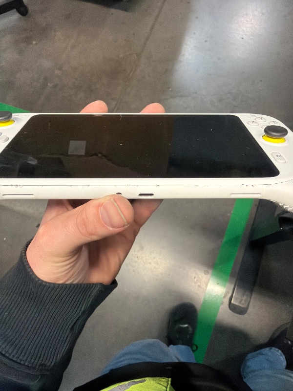 Photo 1 of ***DOES NOT CHARGE, WILL NOT TURN ON***
Logitech G Cloud Gaming Handheld, Portable Gaming Console with Long-Battery Life, 1080P 7-Inch Touchscreen, Lightweight Design, Xbox Cloud Gaming, NVIDIA GeForce NOW, Google Play