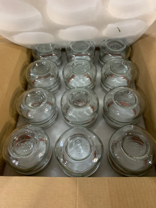 Photo 1 of 24 Pack 4 oz Mason Jars with Lids, Glass Canning Jars with Regular Mouth Lids, Canning Jars for Jam, Candy and Wedding Favors