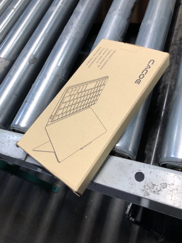 Photo 1 of CACOE Mobilephone Mini Bluetooth Keyboard, Ultra-Thin, Portable and Foldable, Dual-Channel, Suitable for Smartphones and iOS/Android/Windows Systems, Grey
