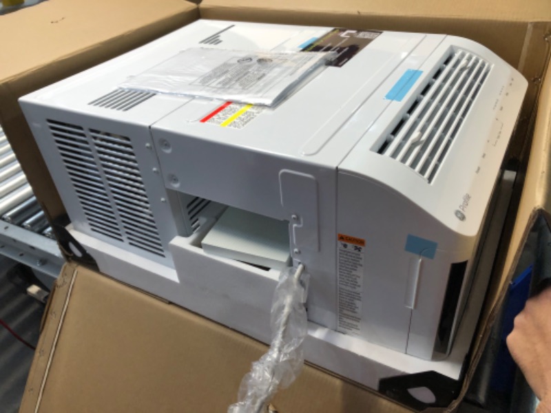 Photo 1 of ***USED - POWERS ON - UNABLE TO TEST FURTHER - LIKELY MISSING PARTS - SEE PICTURES***
AHTT06BC GE Clearview Air Conditioner 6,100, WiFi Enabled, Ultra Quiet for Small Rooms up to 250 Sq. FT, Full Window View with Easy Installation, Flex-Depth Design, 6100