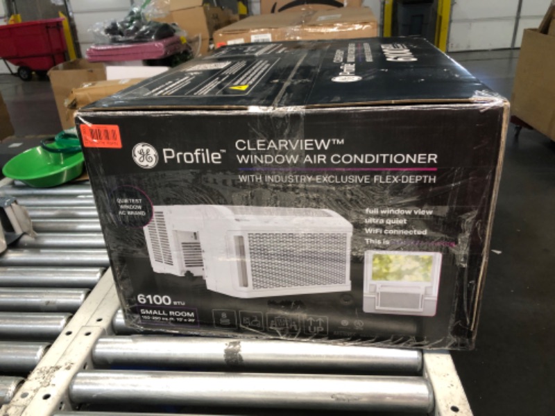 Photo 1 of ***USED - POWERS ON - UNABLE TO TEST FURTHER - LIKELY MISSING PARTS - SEE PICTURES***
AHTT06BC GE Clearview Air Conditioner 6,100, WiFi Enabled, Ultra Quiet for Small Rooms up to 250 Sq. FT, Full Window View with Easy Installation, Flex-Depth Design, 6100