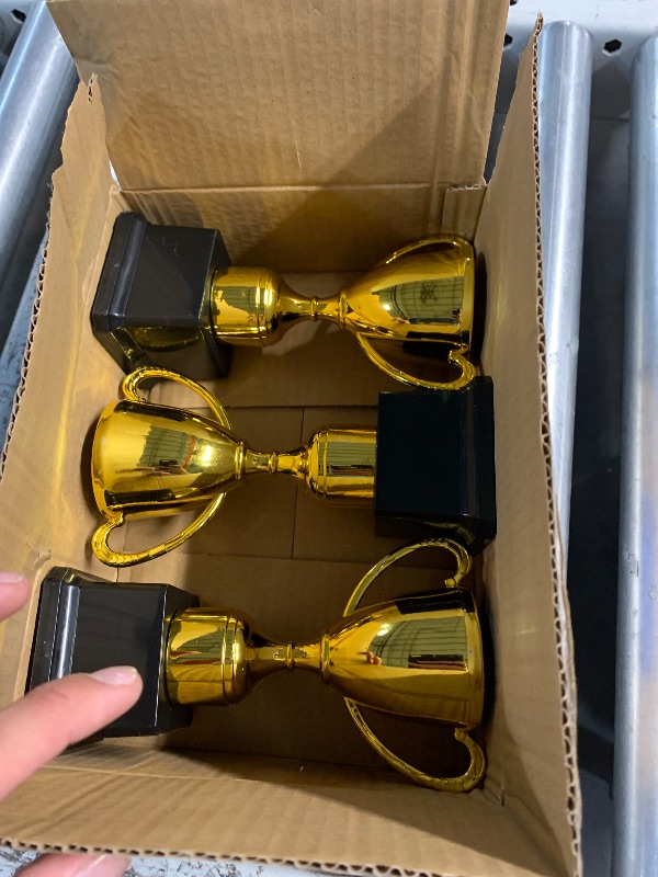 Photo 1 of BLUE PANDA 3 Pack 7 Inch Gold Plastic Trophies for Kids - Award Trophy Cup Set for Sports Tournaments, Competitions