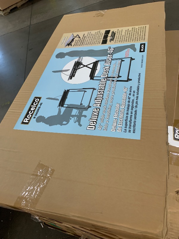 Photo 1 of *** FACTORY SEAL***Rocelco 46" Large Height Adjustable Standing Desk Converter - Quick Sit Stand Up Triple Monitor Riser - Tall Gas Spring Assist Computer Workstation - Retractable Keyboard Tray - Black (R DADRB-46)