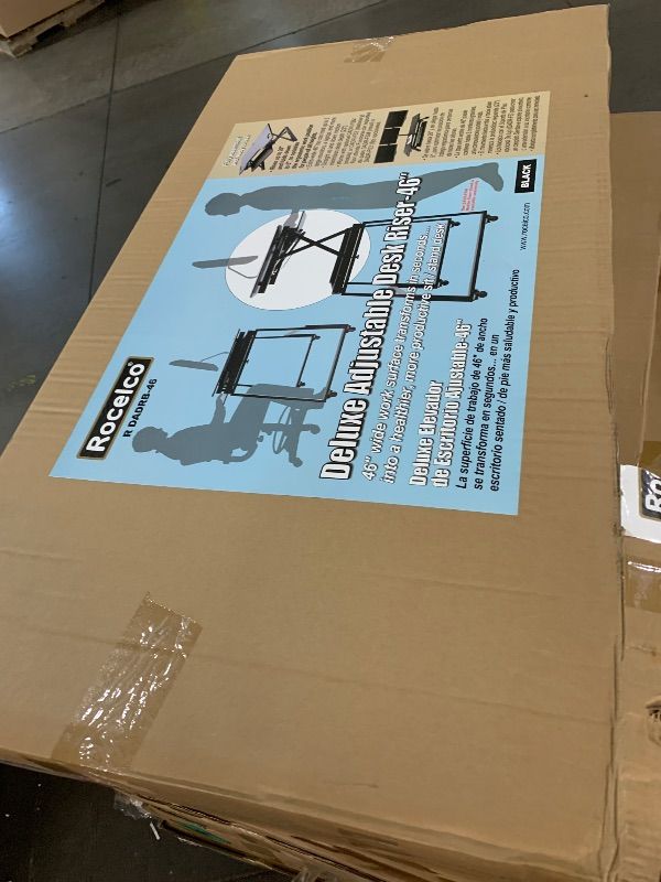 Photo 1 of *** FACTORY SEAL***Rocelco 46" Large Height Adjustable Standing Desk Converter - Quick Sit Stand Up Triple Monitor Riser - Tall Gas Spring Assist Computer Workstation - Retractable Keyboard Tray - Black (R DADRB-46)