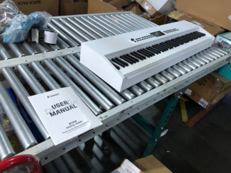 View 7 of Donner DDP-95 Beginner Digital Piano with 88 Key Weighted Keyboard, Wireless Connection, Record, 4.3" LCD, 610 Tones, 600 Rhythms, 110 Demos, 3 Piano Teaching Modes, Full Size Piano Keyboard, White