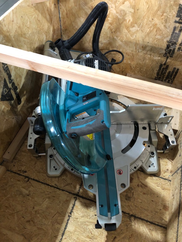 Photo 1 of ** TRUCK OR TRAILER PICK UP ONLY***ITEM TESTED FOR POWER, UNABLE TO TEST FURTHER*** Makita LS1219L 12" Dual-Bevel Sliding Compound Miter Saw with Laser