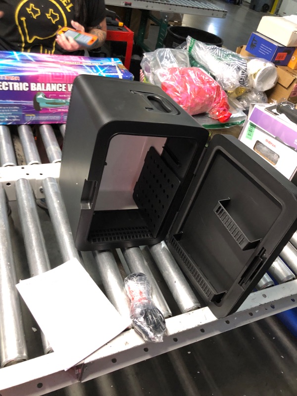 Photo 1 of ***USED - POWERS ON - UNABLE TO TEST FURTHER***
Frigidaire Portable 10L, 15-can Mini Fridge Brushed Stainless Rugged Refrigerator, EFMIS188-SS