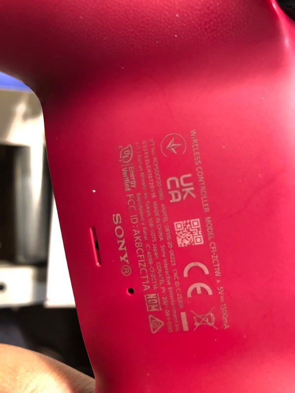 Photo 1 of PlayStation DualSense® Wireless Controller - Cosmic Red