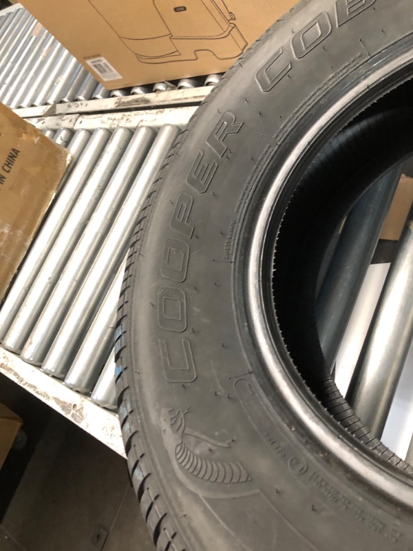 Photo 1 of (dirt and scratches)
Cooper Cobra Radial G/T All-Season P235/70R15 102T Tire
