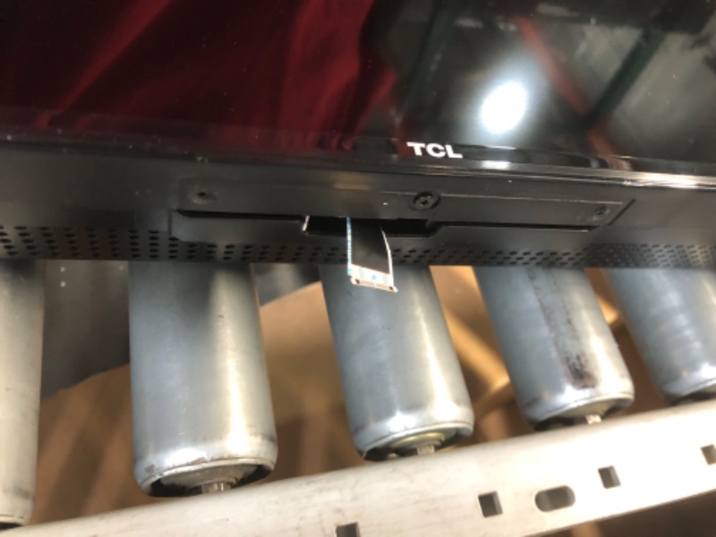 Photo 1 of **DAMAGED / PARTS ONLY** TCL 50-Inch Class S4 4K LED Smart TV with Roku TV (50S450R, 2023 - Model), Dolby Vision, HDR, Dolby Atmos, Works with Alexa, Google Assistant and Apple HomeKit Compatibility, Streaming UHD Television *Power button broke*