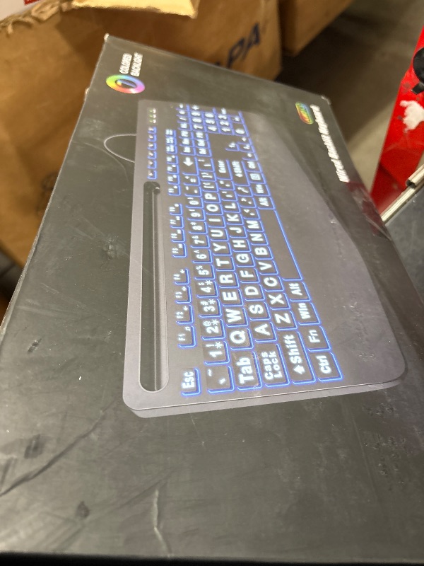 Photo 1 of SABLUTE Large Print Backlit Computer Keyboards, Wired Lighted USB Keyboards with 7-Color Backlit, Wrist Rest, Phone Holder, Easy to Read and Type for Laptop, PC, Windows, Desktop