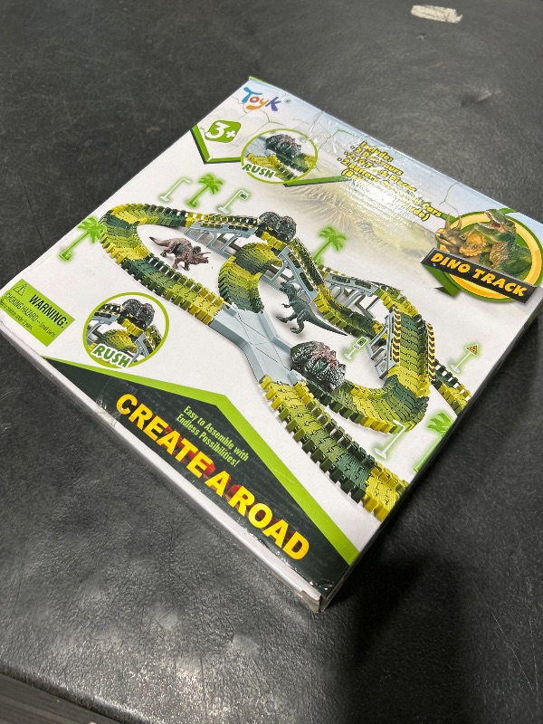 Photo 1 of Dinosaur Toys, 252 PCS Create A Dinosaur World Road Race Tracks, Flexible Track Playset, 2pcs Dinosaur Car for 3 4 5 6 Year Old Boys Girls Birthday Party Favor Gift