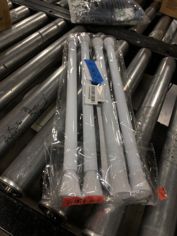 Photo 1 of MEXAU 4 Pack White Tension Rod 18 To 28 Inch Short Tension Rods Adjustable Spring Curtain Rods No Drilling Extendable Small Tension Rod For Closet Cupboard Refrigerator