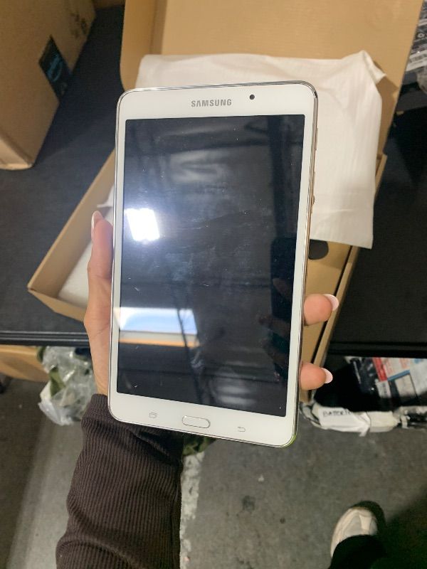 Photo 1 of SAMSUNG TABLET- NO CHARGER - TABLET ONLY - 