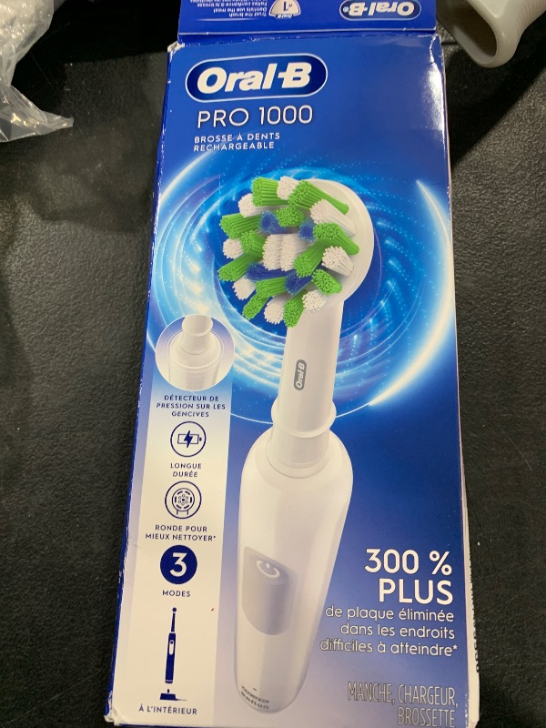 Photo 1 of Oral-B Pro 1000 Rechargeable Electric Toothbrush, White