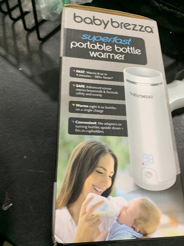 Photo 1 of Baby Brezza Superfast Portable Baby Bottle Warmer – 50% Faster - Travel Breastmilk Warmer and Formula Warmer - Safe, Even Heating - Up to 9oz - No Adapters, White