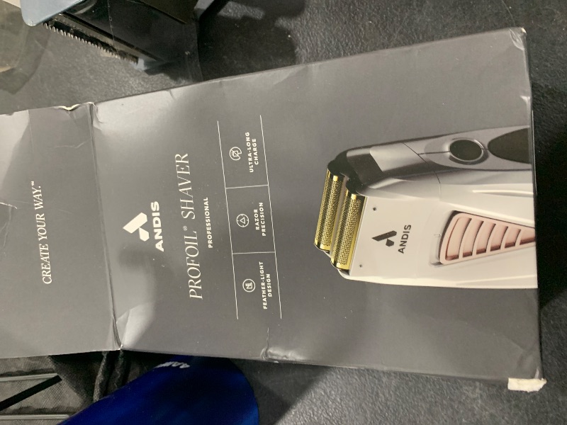 Photo 1 of Andis TS-1 17235 Pro Foil Lithium Titanium Foil Shaver, Cord/Cordless, Smooth Shaving Cordless Shaver with Charger, Gray