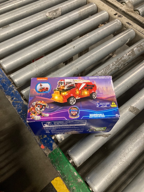 Photo 1 of ***FIGURE MISSING**
Paw Patrol: The Mighty Movie, Firetruck Toy with Marshall Mighty Pups Action Figure, Lights and Sounds, Kids Toys for Boys & Girls 3+