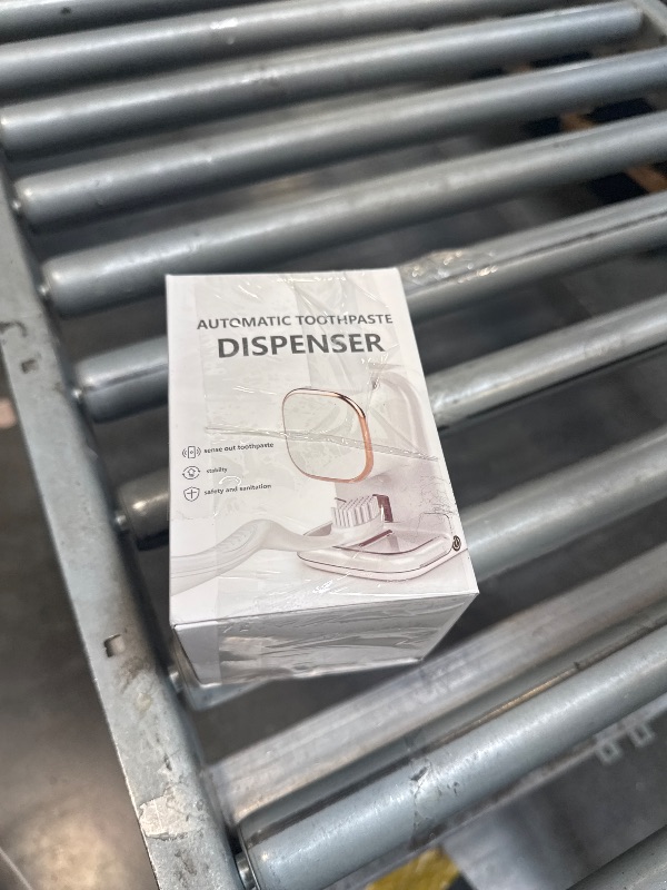 Photo 1 of Automatic Toothpaste Dispenser,Wall Mounted Electric Toothpaste Dispenser for Kids and Adults,Toothpaste Dispenser for Bathroom (Black