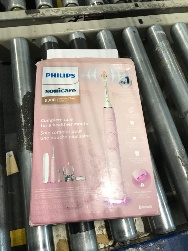 Photo 1 of Philips Sonicare DiamondClean Smart 9300 Electric Toothbrush, Sonic Toothbrush with App, Pressure Sensor, Brush Head Detection, 4 Brushing Modes and 3 Intensity Levels, Pink, Model HX9903/25