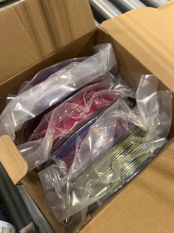 Photo 1 of AMOLEN 3D Printer Filament Bundle, Triple Colors Coextrusion Silk PLA Filament 1.75mm +/-0.02mm,Shiny Color Change 3D Printer Filament for Most FDM 3D Printer 200g X 4 Pack
