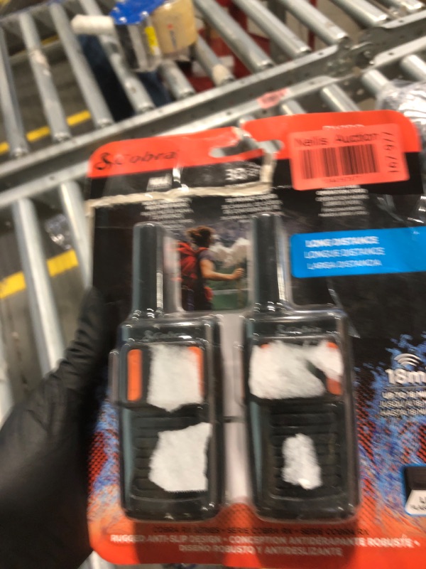 Photo 1 of ***missing USB charging cord, see photo for charging cord design*** Cobra RX180 Walkie Talkies – 18-Mile Long Range Signal, 22 Preset Channels, NOAA Weather Alerts, 10 Call Tones, Voice-Activated, Compact and Reliable, 2-Pack, Orange/Black