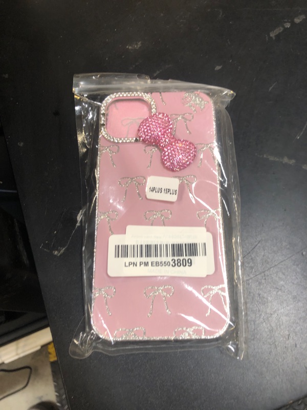 Photo 1 of Pajony Cute Bow Cases for iPhone 15 Plus/14 Plus with Glitter Diamond Camera Protector, Pink Bling Rhinestone Bow Design, Hard Protective Phone Cover for Girls Women