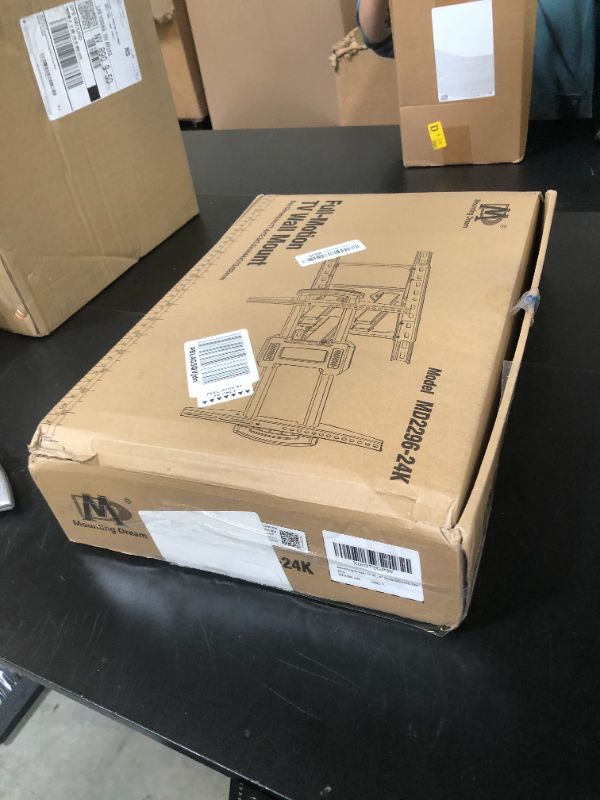 Photo 1 of USX MOUNT Full Motion TV Wall Mount 42"-84" TVS, Fits 16" 18" or 24" Studs, Heavy Duty TV Mounts Bracket with Dual Articulating Arms Tilt Swivel Extension Max VESA 600x400mm, Weight Capacity 110lbs