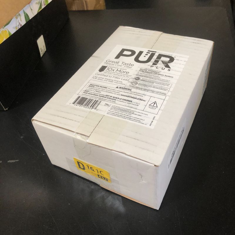 Photo 1 of PUR PLUS Vertical Faucet Mount Water Filtration System, Lead-Reducing Filter, Great-Tasting Water, Easy Install, Lasts 100 Gallons, Compatible with Sinks with External Aerators, Grey