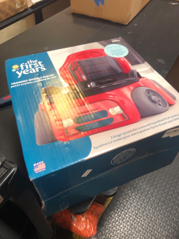 Photo 1 of The First Years Training Wheels Racer Potty Training Toilet - Race Car Training Potty - Includes Detachable Toddler Toilet Seat and Kids Potty - Ages 18 Months and Up