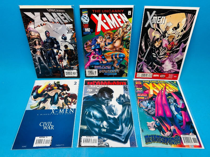 Photo 1 of 195010…6 X-men comics in plastic sleeves 