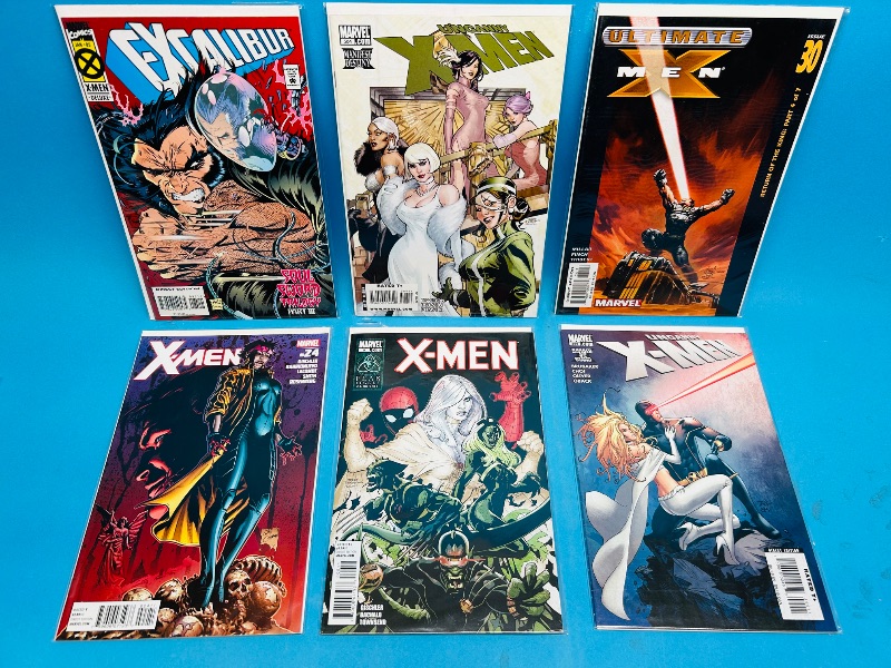 Photo 1 of 195013…6  X-men comics in plastic sleeves 