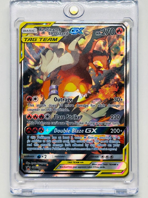 Photo 1 of 195031…Pokémon hologram Reshiram and Charizard GX black star promo card SM201 Tag Team