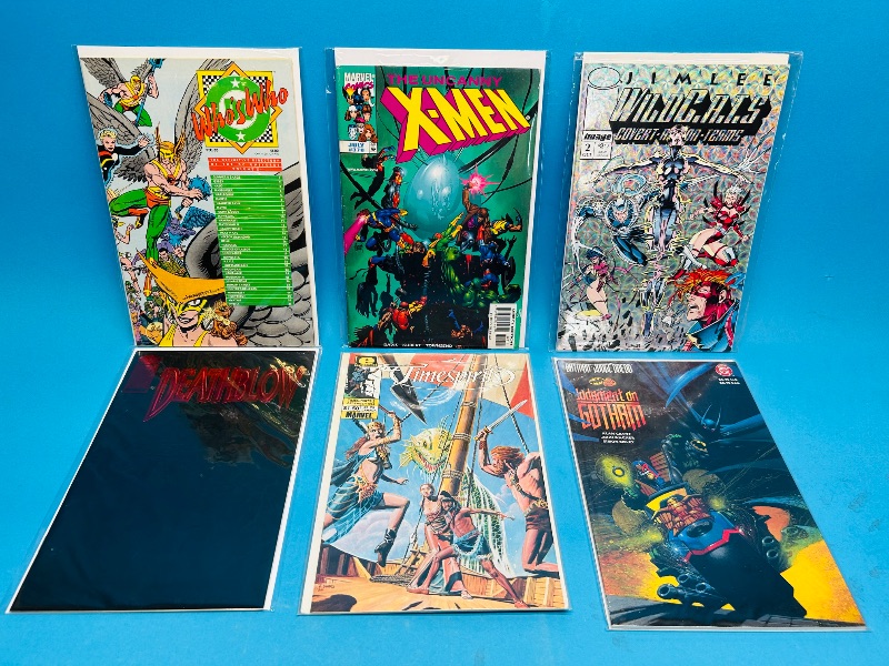 Photo 1 of 195102…6  comics in plastic sleeves 