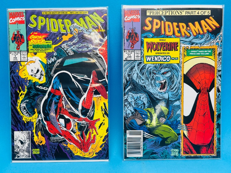 Photo 1 of 195106…2 vintage Spider-Man  comics in plastic sleeves 