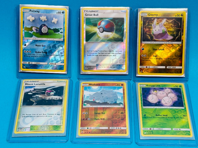 Photo 1 of 195120…6 reverse holo Pokémon cards in hard plastic sleeves 