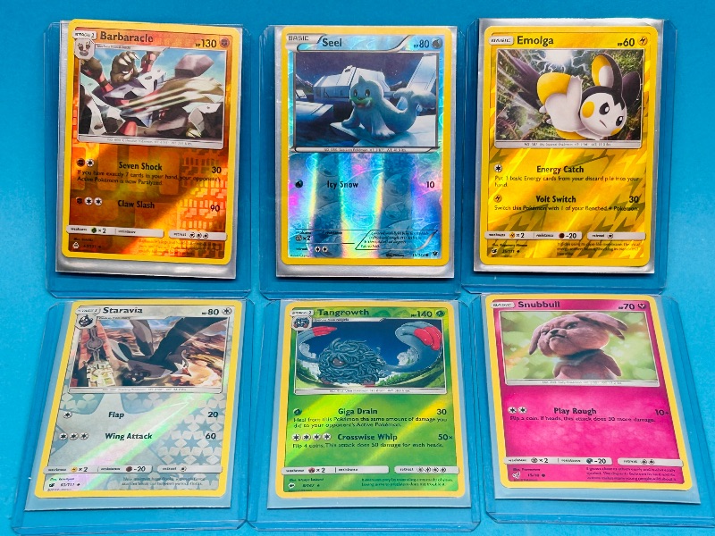 Photo 1 of 195121…6  reverse holo Pokémon cards in hard plastic sleeves 