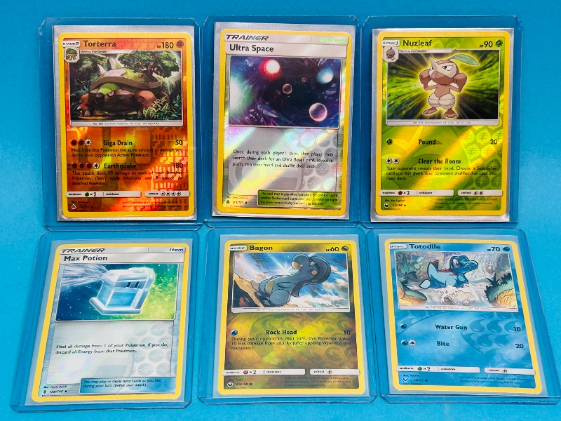 Photo 1 of 195134… 6 reverse holo Pokémon cards in hard plastic sleeves 