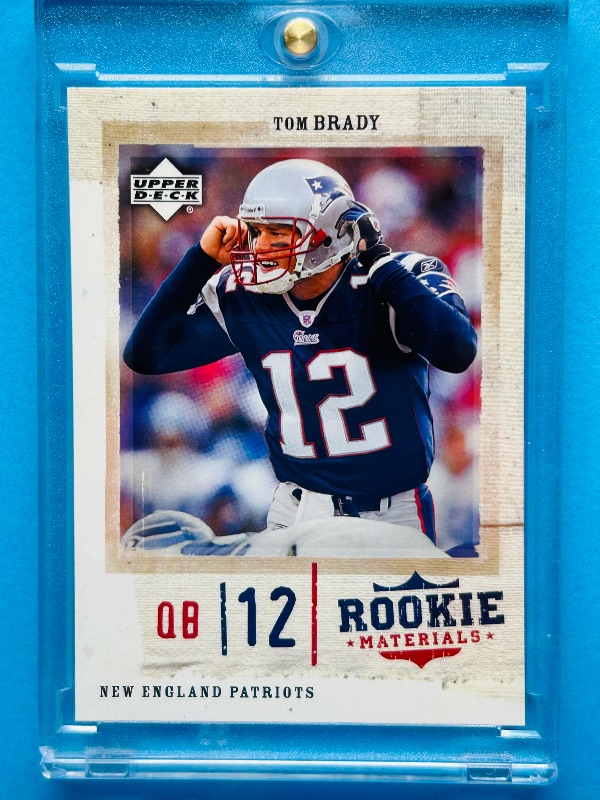 Photo 1 of 195239…Tom Brady rookie material card 51 in hard plastic case 