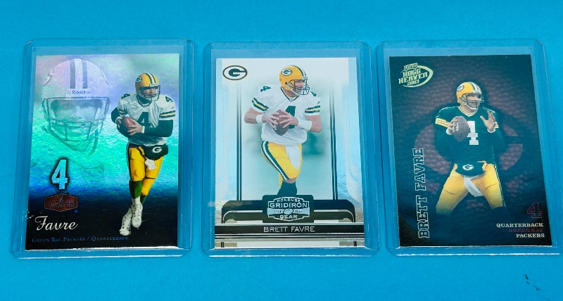 Photo 1 of 195247…3 Brett Favre cards in hard plastic sleeves 