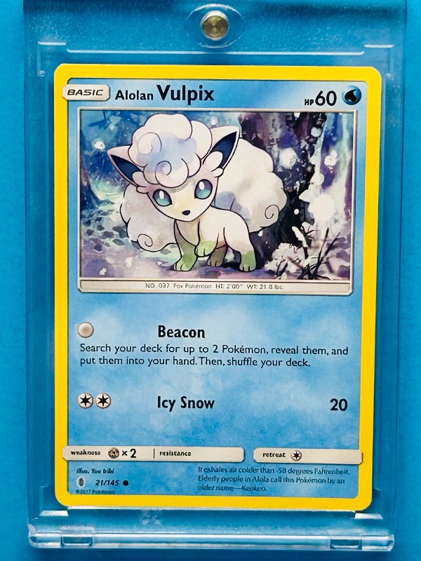 Photo 1 of 195254…Alolan Vulpix Pokémon card in hard plastic case 